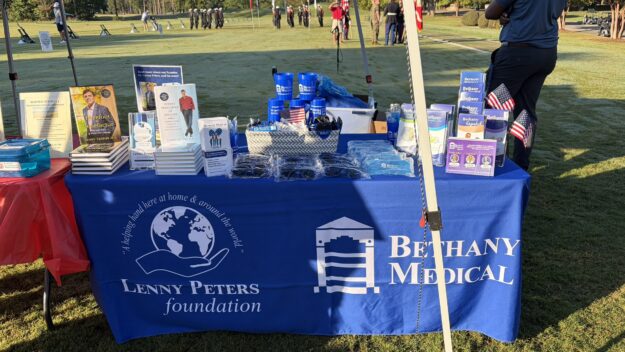 BM Table Bethany Medical and Lenny Peters Foundation information table at the military charity golf tournament